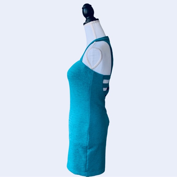 OFF  BEBE TEAL BODYCON RIBBED CUTOUT MINI DRESS - Picture 3 of 15